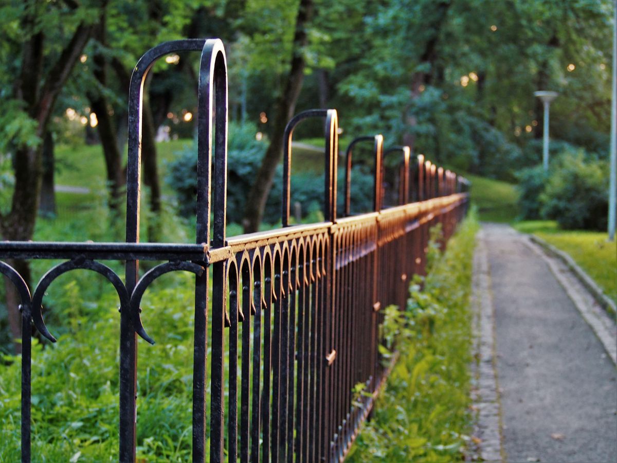 Black ornamental aluminum fence with the look of wrought iron